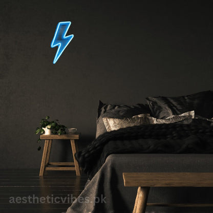 Red bolt lightning LED neon sign mounted on brick wall, modern neon wall décor in Pakistan